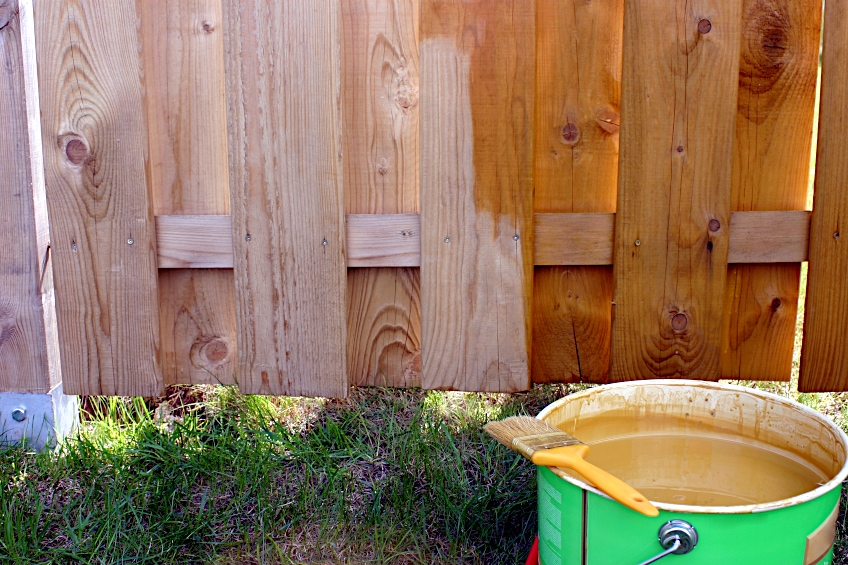 Stain Enhances and Protects Wooden Fence